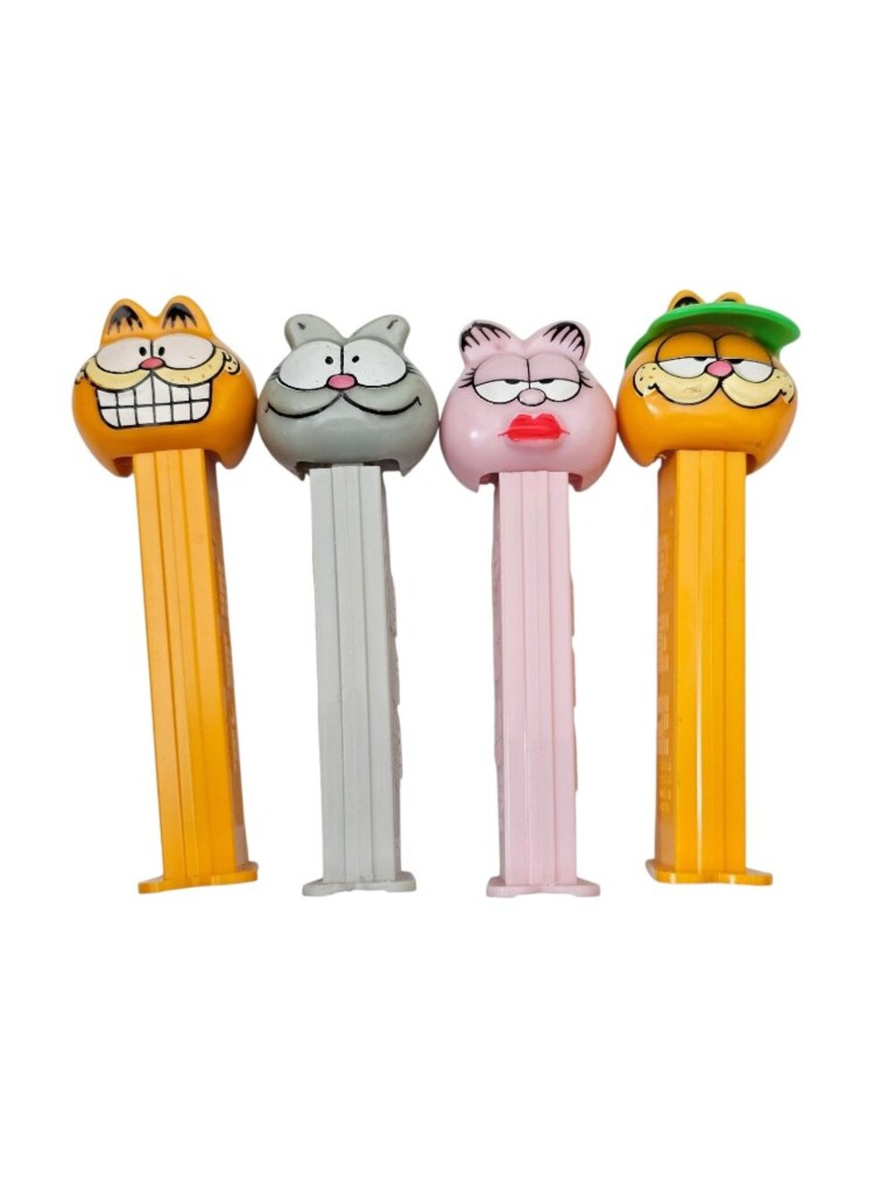 Vintage Garfield Lot of 4 Pez Dispensers Garfield, Arlene, Nermal Pink Gray